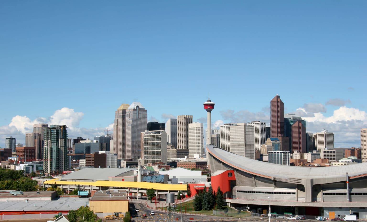 Calgary downtown skyline under a blue summer sky