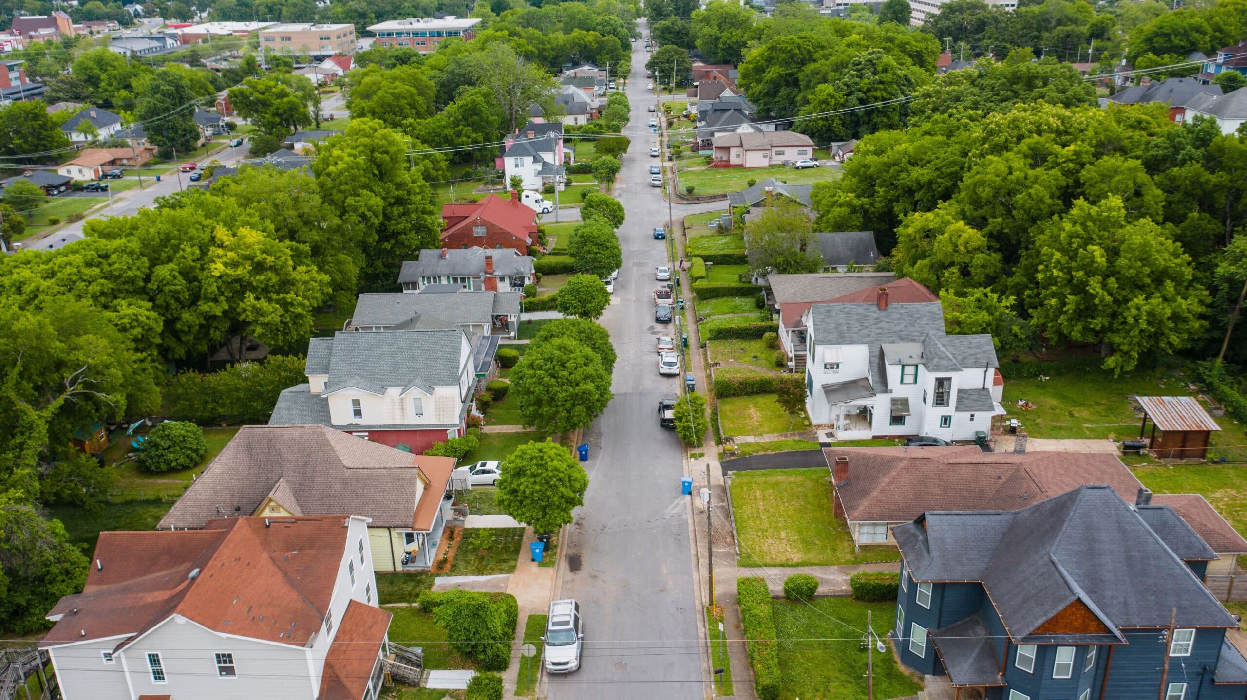 Tree lined residential street in an established inner city Calgary neighbourhood in summer
