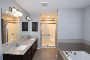 Empty rental bathroom naturally lit 6