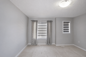 Empty rental room in natural light 4