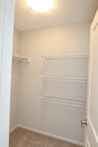 Empty rental room naturally lit 15