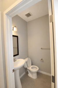 Natural light bathroom with clean fixtures 7