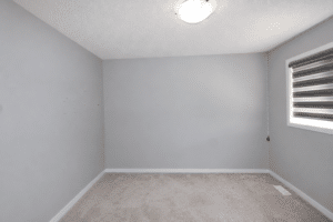 Naturally Lit Empty Rental Room 18
