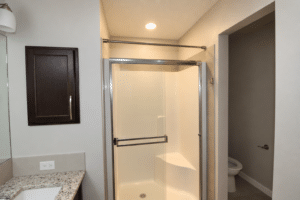 Naturally lit uncluttered rental bathroom 7
